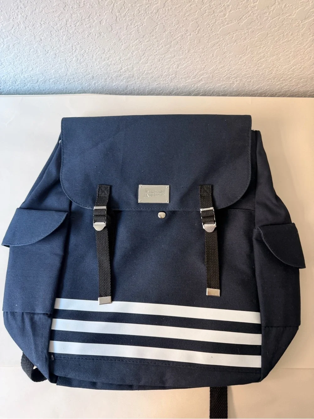 Jean Paul Gaultier Navy Canvas Backpack | White Stripe Designer Logo Bag